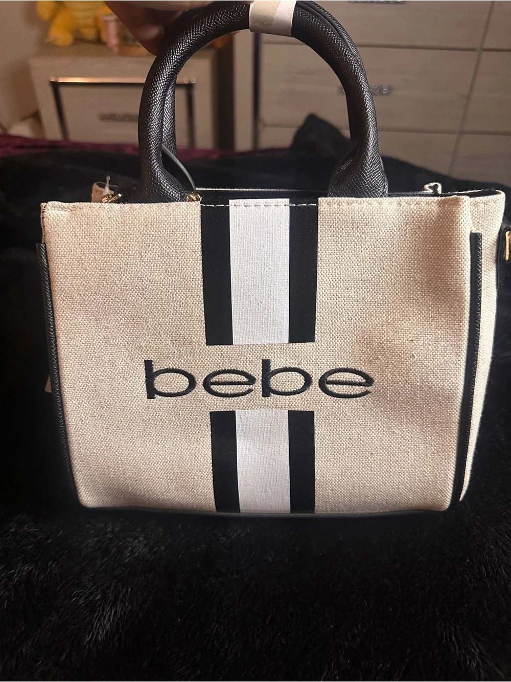 bebe Beige Canvas Tote with Black Trim and Logo